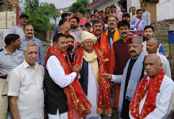 BJP candidate from Jammu-Reasi LS Constituency, Jugal Kishore Sharma along with others during campaigning in Nagrota area on Thursday.