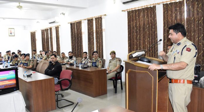 Officer delivering lecture during workshop at SKPA Udhampur.