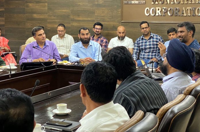 Officials attending training cum interactive session organised by the Housing and Urban Development Department in Jammu on Sunday.