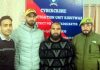 Cops of CIU Kishtwar pose for a photograph with complainant whose money was defrauded online.