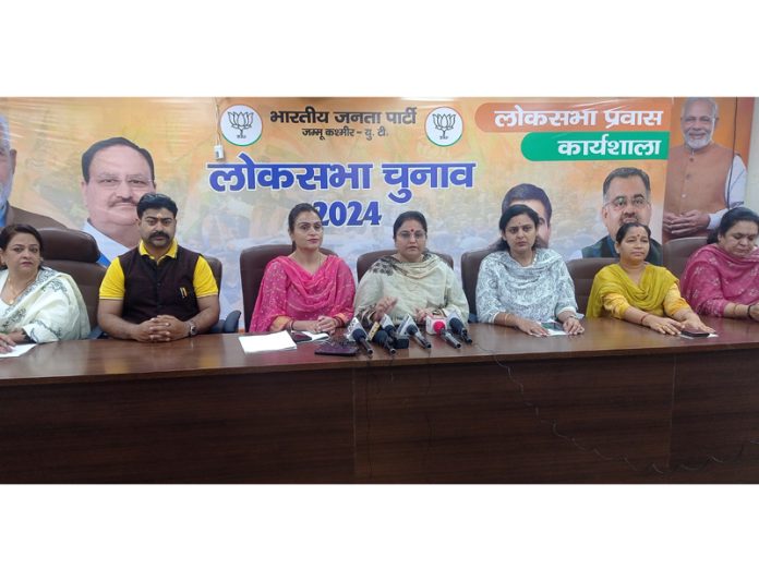 BJP National Executive Member Priya Sethi flanked by party leaders at a press conference at Jammu on Thursday.
