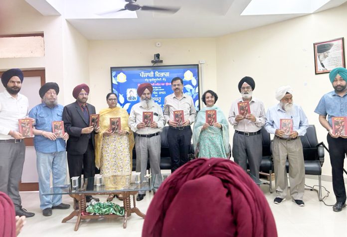 A collection of Punjabi short stories of R S Rajan being released during interaction programme at JU.