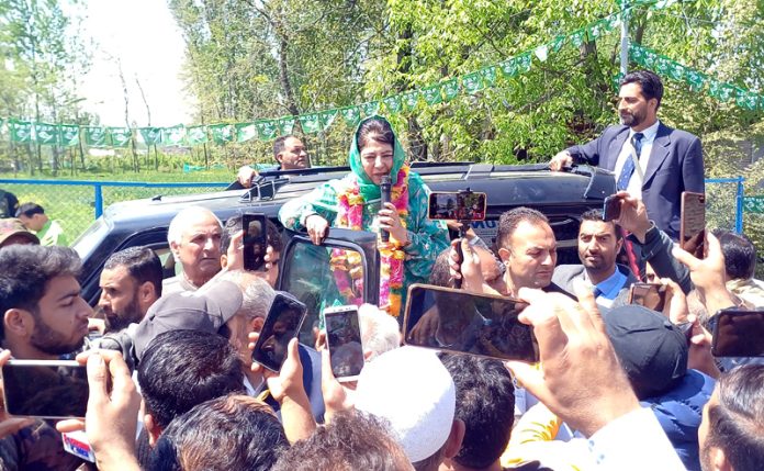 Mehbooba Mufti during road show in Anantnag constituency. —Excelsior/Sajad Dar