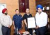 Vikas Padha, Agronomist presents accreditation certificate to Director Agriculture, Arvinder Singh Reen.