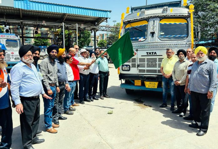 Senior IOCL Officers and Transporters flagging tankers towards Ladakh from Jammu on Tuesday.