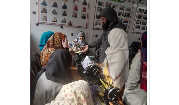 Women undergoing training of sewing clothes under ESDP scheme at a training centre in Gurez.