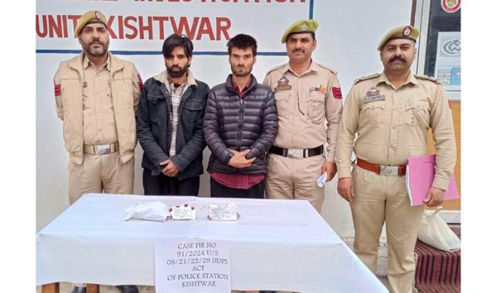Drug peddlers in police custody. —Excelsior/Tilak Raj
