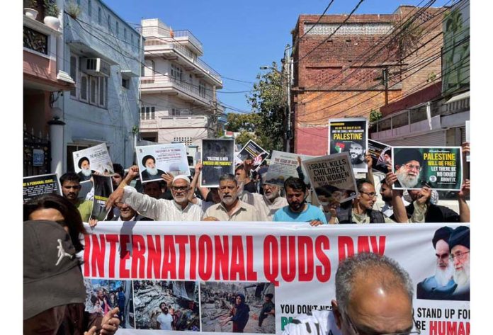Activists of Anjuman-e-Imamia Jammu holding a peaceful protest on Friday.