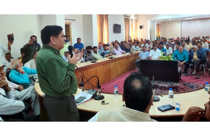 PoJK DPs’ leader Rajiv Chuni addressing a gathering at Rajouri on Sunday.