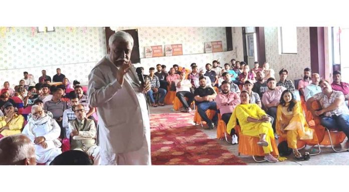 Additional general secretary J&K National Conference Ajay Kumar Sadhotra addressing workers at Barnai in Jammu North Assembly Constituency.