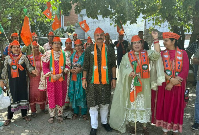 BJP vice president, Yudhvir Sethi during door to door campaign in Purani Mandi on Saturday.