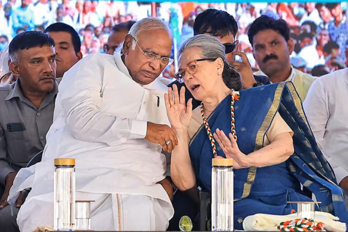 Congress President Mallikarjun Kharge with party leader Sonia Gandhi during a public meeting, ahead of Lok Sabha elections, in Jaipur.