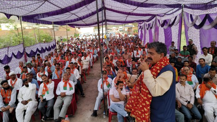 BJP candidate from Jammu-Reasi Parliamentary Constituency, Jugal Kishore Sharma addressing a public gathering at his native village Kishenpur.