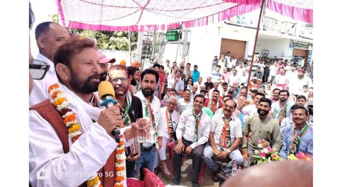 Cong candidate Ch Lal Singh addressing public meeting in Hiranagar on Sunday.