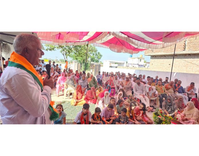 Senior BJP leader and former Minister, Choudhary Sukhnandan Kumar addressing an election meeting at Makwal camp on Thursday.