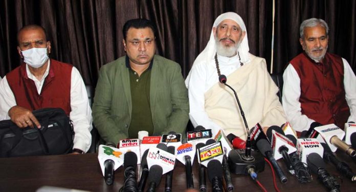 Sant Swami Paul along with kin of Bhaderwah man Ravikant addressing a press conference at Jammu.