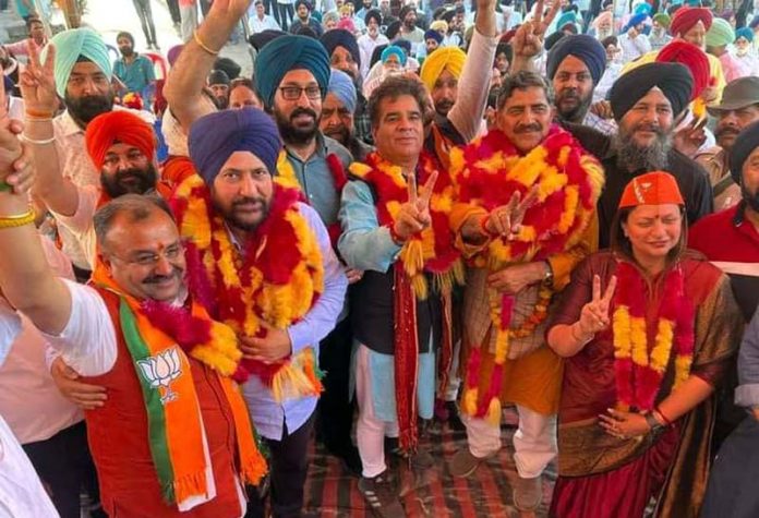 BJP leaders campaigning in favour of Jugal Kishore in Jammu on Monday.