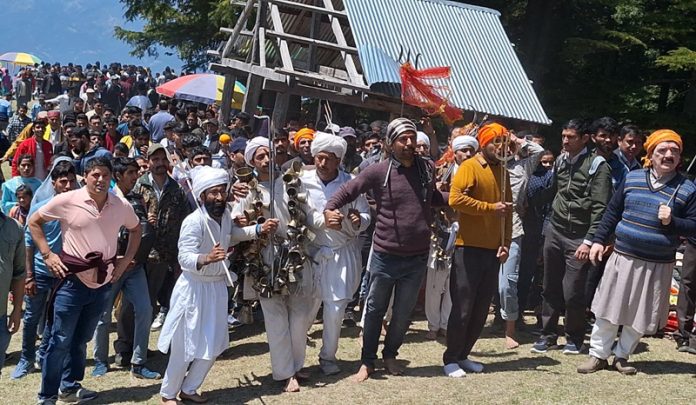 Devotees at a religious place in Bhaderwah to celebrate Nag Baisakhi on Friday. - Excelsior/Tilak Raj