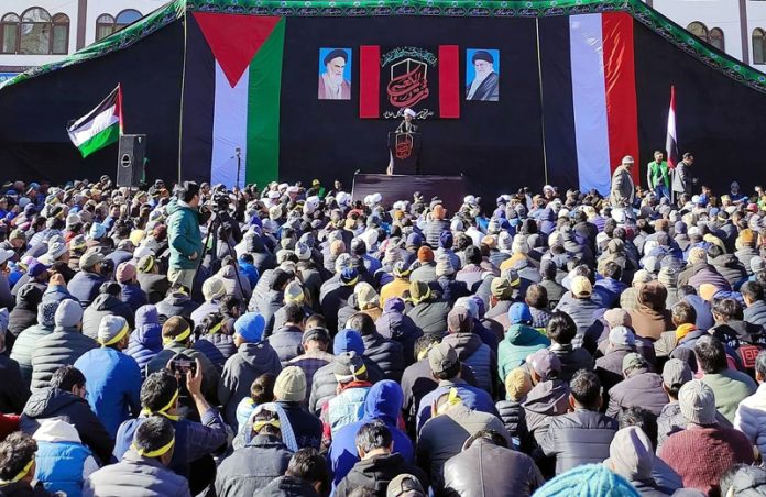 Mourners listening a speaker during a ceremony organized in Kargil town to commemorate Hazrat Imam Ali's martyrdom. -Excelsior/Basharat Ladakhi