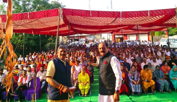 MP Jugal Kishore Sharma and BJP vice president Surjit Singh Salathia addressing election rally at Gurah Slathia on Monday.