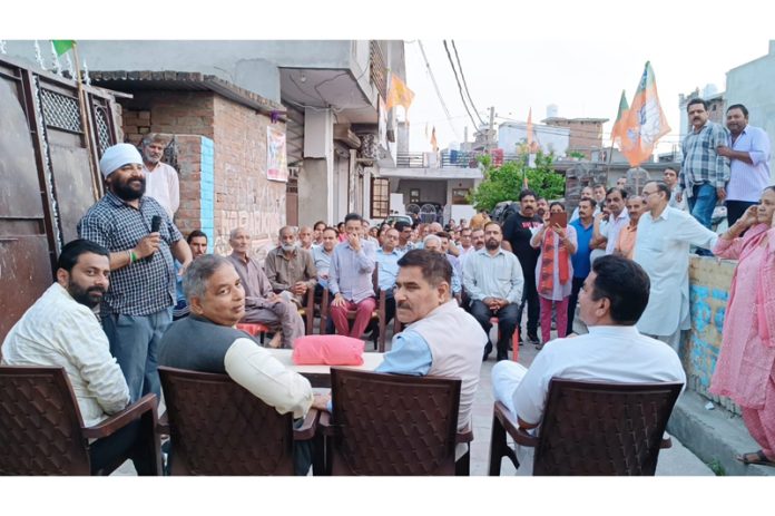 Former Minister, Sat Sharma and other BJP leaders at a party meeting at Talab Tillo on Friday.