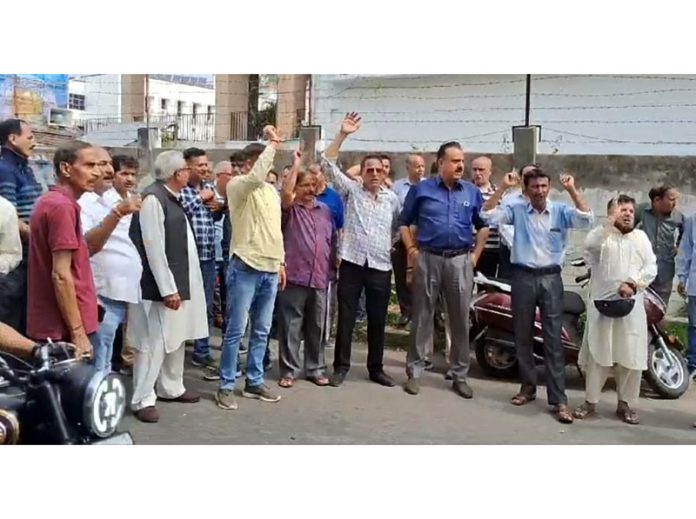 Relief holders protesting at Jammu on Monday.