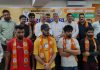 BJP leaders posing with new entrants from AAP and other organisations at Jammu on Thursday.