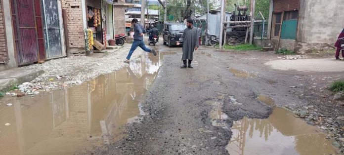 People suffer as Kheerbhawani Tulmulla road is in bad shape. -Excelsior/Firdous Ahmad