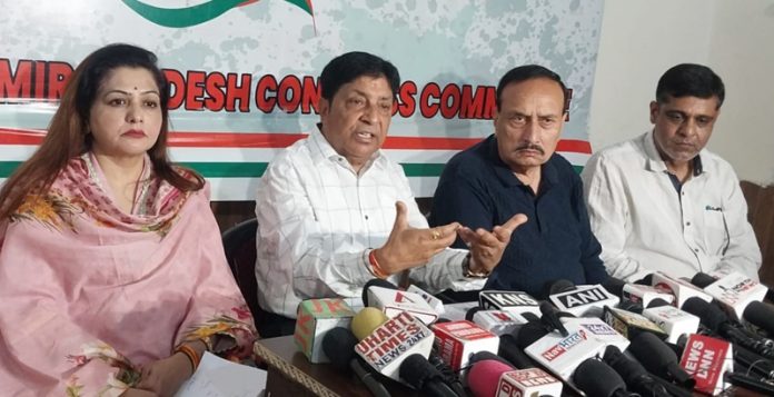 AICC observer, Naresh Gupta, flanked by senior leaders Ved Mahajan and others addressing press conference in Jammu. -Excelsior/Rakesh