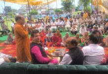 BJP president Ravinder Raina and other senior leaders at an election meeting at Ramgarh village on Tuesday.