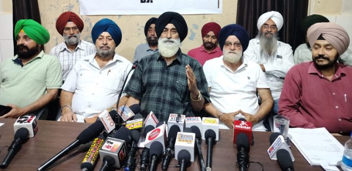 Sikh Progressive Front leaders at a press conference in Jammu.