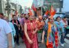 Senior BJP leader and former Minister, Priya Sethi during door to door campaign in Jammu on Monday.