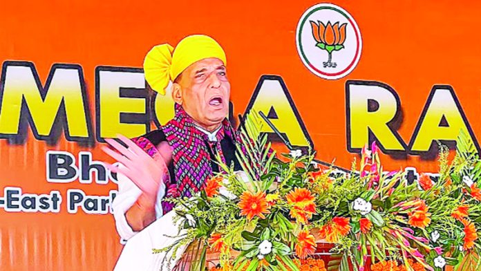 Defence Minister Rajnath Singh addresses a public rally ahead of Lok Sabha polls.