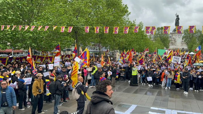 Paris: Campaigners for Tibet, Xinjiang protest as Chinese president Xi Jinping arrives in France