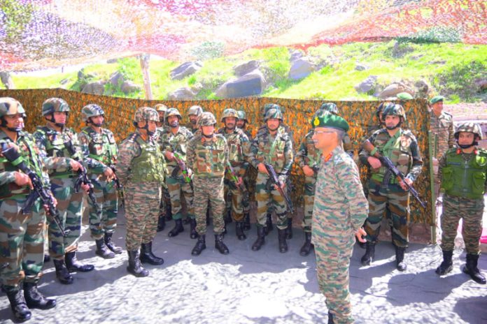Northern Command chief Lt Gen MV Suchindra Kumar interacting with troops in Poonch on Tuesday.