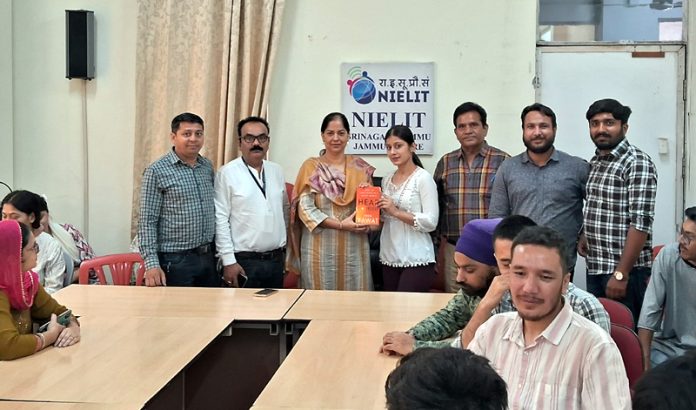 The members of YPF presenting a copy of the book 'Hear Yourself' to Sarita Kour in Jammu on Monday.