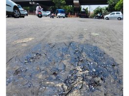 Tarcoal melts on a Jammu city road on a hot summer day. -Excelsior/Rakesh