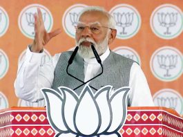 Prime Minister Narendra Modi addresses a public meeting in Anand on Thursday. (UNI)