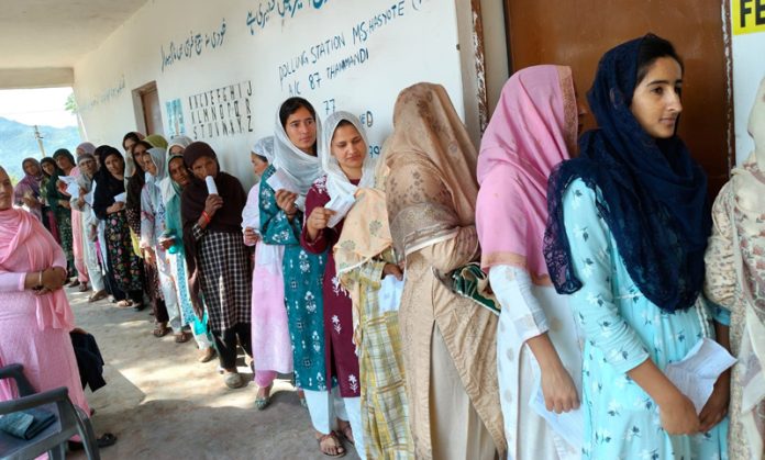 Women wait in a long queue to cast their vote at Thannamandi in Rajouri district. More pics on page Nos 3, 5 & 7.