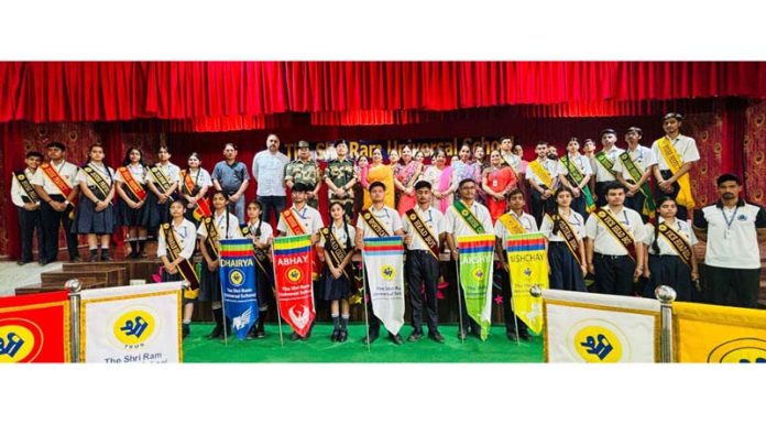 Newly Elected Students Council posing along with dignitaries during a programme in school.