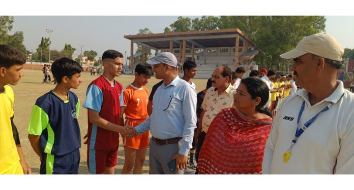 DYSS officer Reasi, Tarsem Singh interacting with players during district level inter-zonal competitions in various disciplines.