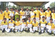 Cricket team posing along with Chief Guest during an T-20 cricket tournament at Jammu.