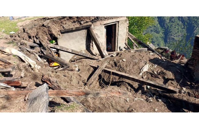 The collapsed house in Drabshalla, Kishtwar on Sunday. -Excelsior/Tilak Raj