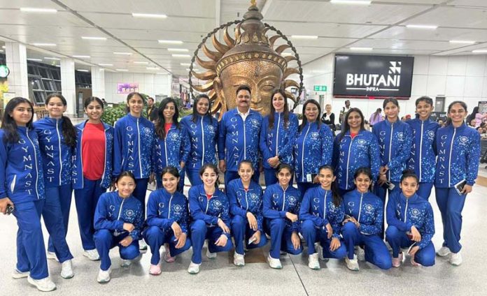 Indian Gymnastic team posing for group photograph.