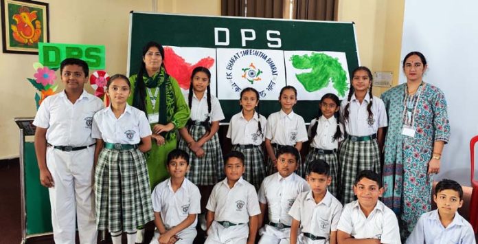 Students of DPS Kathua posing along with students during an activity session.