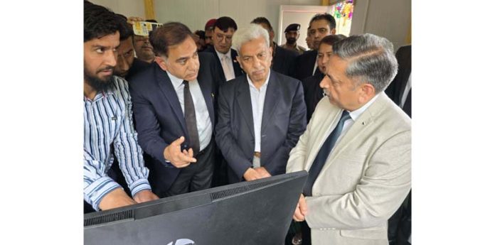 Justice Sanjeev Kumar Shukla being briefed on court operations at district court complex, Baramulla.