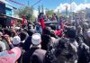 NC candidate for Baramulla parliamentary constituency Omar Abdullah surrounded by people during a road show in Baramulla district.