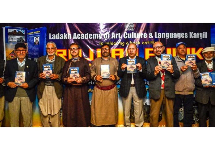 Guests releasing Mohd Sadiq Hardassi’s book ‘Rajgan Purik’ at Kargil