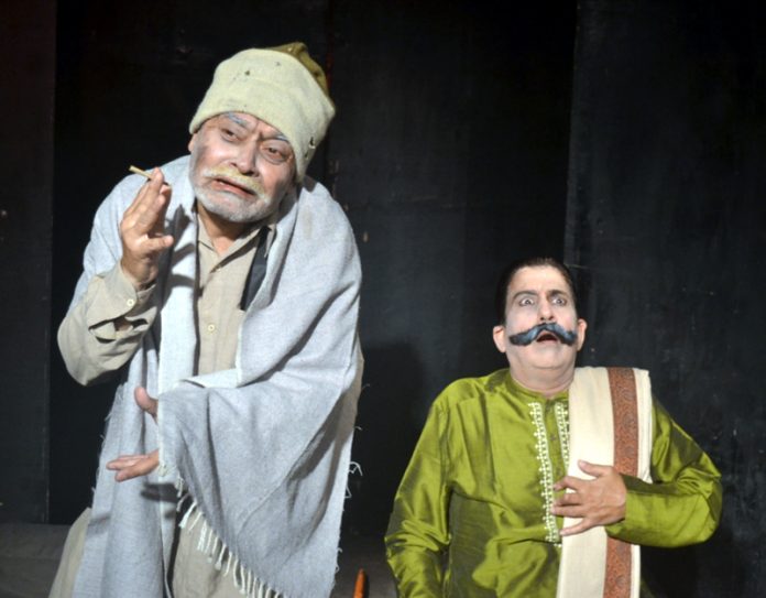 Artists performing during a play staged by Natrang on Wednesday.