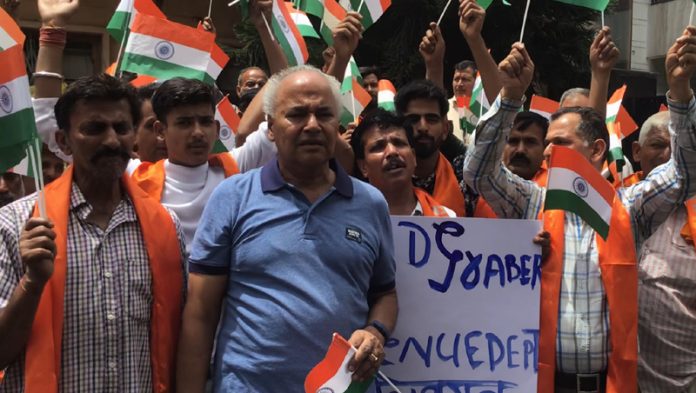 DF&SS workers raising slogans during a protest rally at Jammu on Friday.